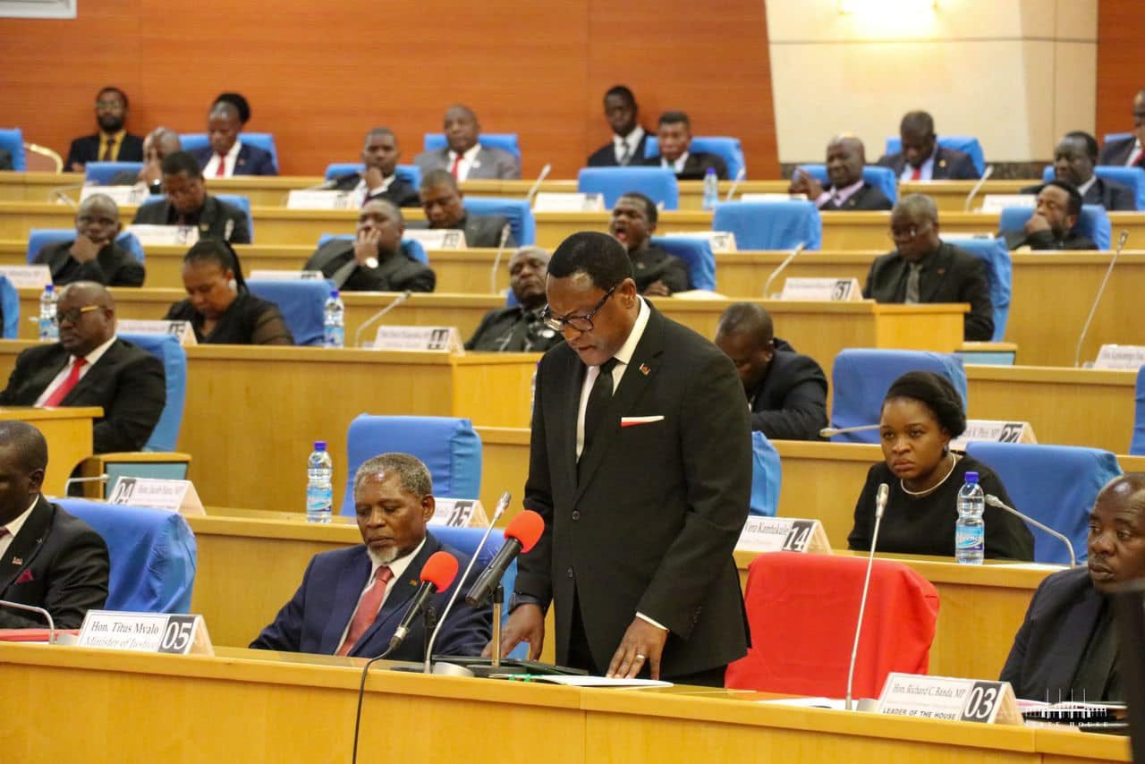 May be an image of 9 people, people standing, people sitting and indoor