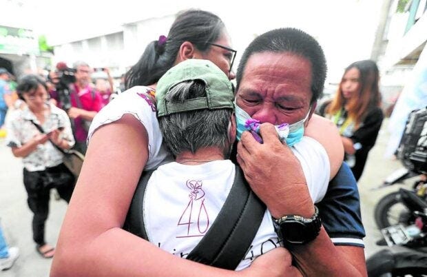 ‘SHOCKING’ RULING Farmer Raymond Manalo breaks intotears after a court dismissed on Friday the charges of kidnapping and serious illegal detention filed against retired Gen. Jovito Palparan. —NIÑO JESUS ORBETA