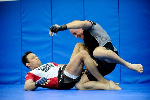 Learn to neutralize the clinch and to take down in MMA with Renzo Gracie‏ |  Graciemag