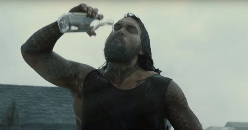 jason mamoa as aquaman drinking down