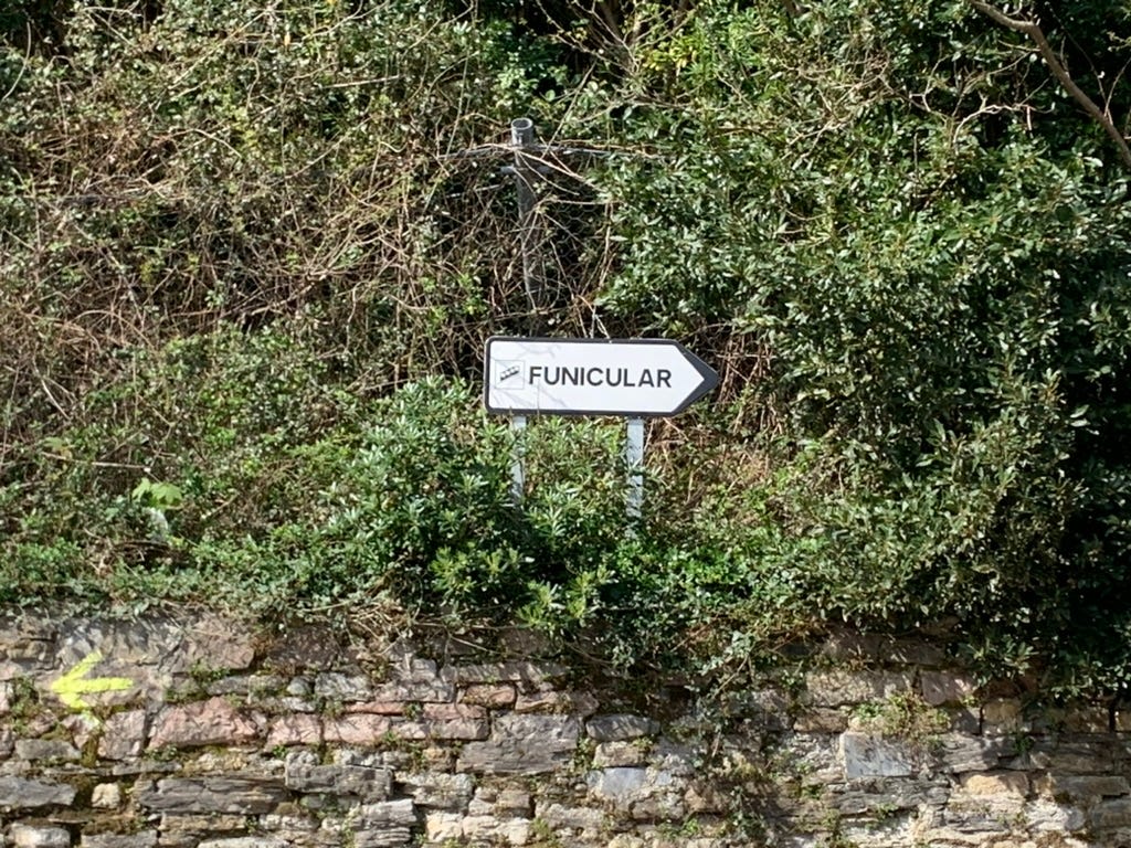 A sign points the way to the funicular
