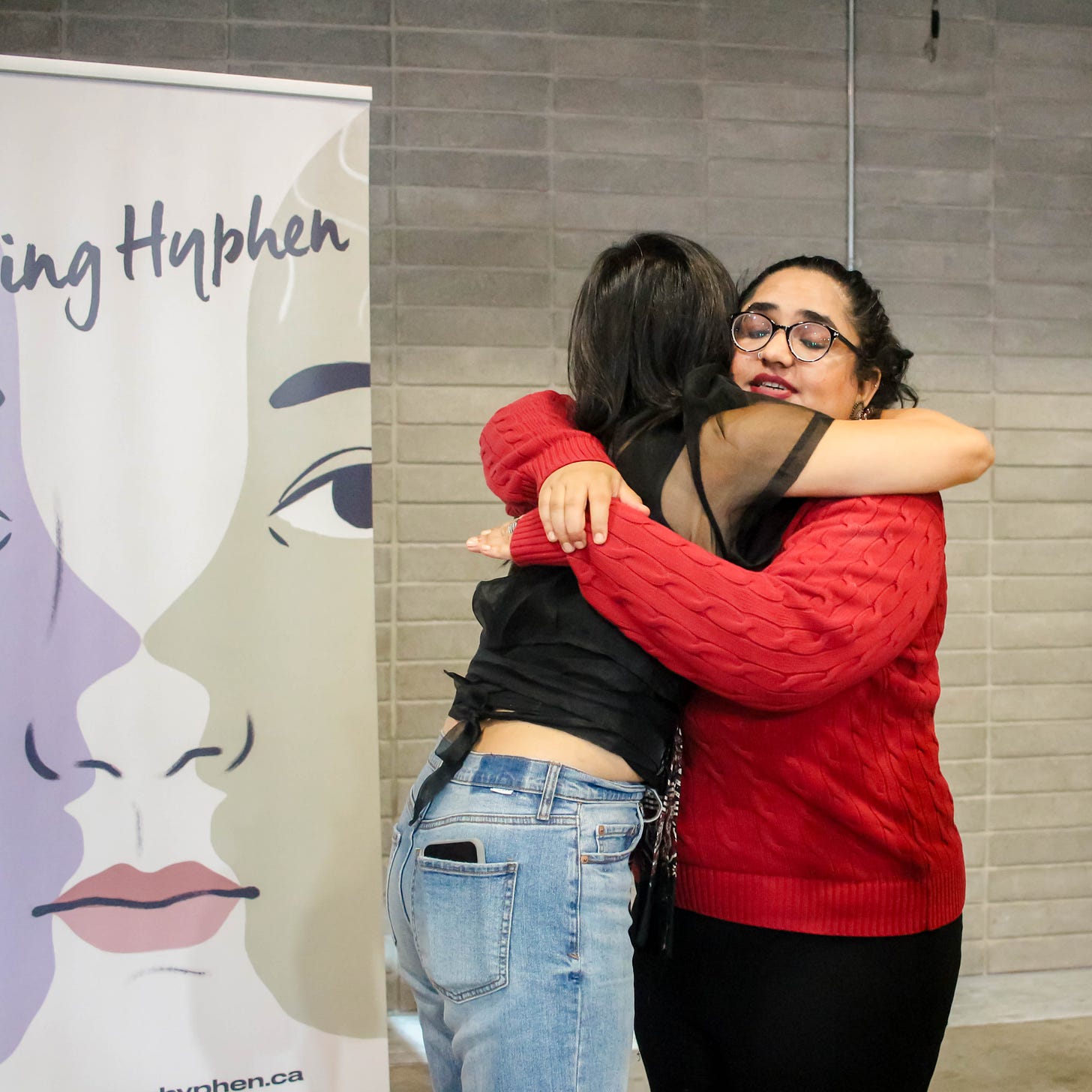 Justine hugging slam poet Khushu