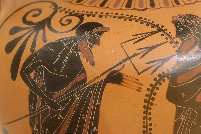 Color photograph of a black figure vase: Poseidon gestures toward Zeus with his trident