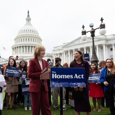 Rep AOC and Sen Smith speak at a press conference for the introduction of the Homes Act