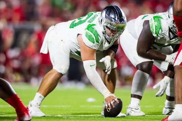 LUBBOCK, TEXAS - SEPTEMBER 09: Jackson Powers-Johnson #58 of the Oregon Ducks lines up over the ball during the second half of the game against the Texas Tech Red Raiders at Jones AT&amp;T Stadium on September 09, 2023 in Lubbock, Texas. (Photo by John E. Moore III/Getty Images)