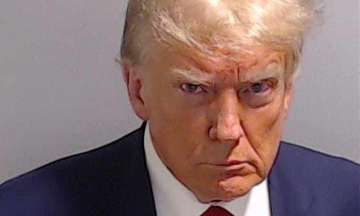 Trump mugshot released after surrendering in Fulton county | Donald Trump |  The Guardian
