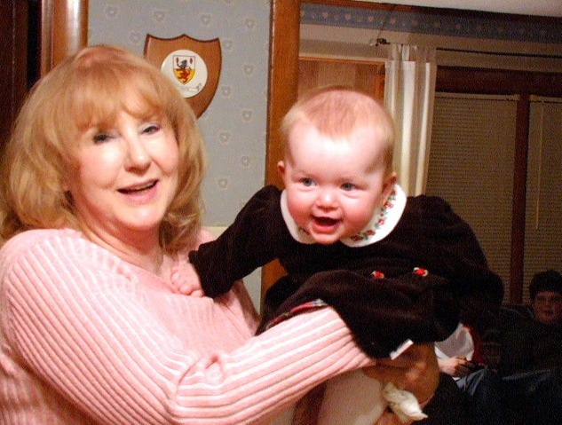 May be an image of 1 person, blonde hair, baby and smiling