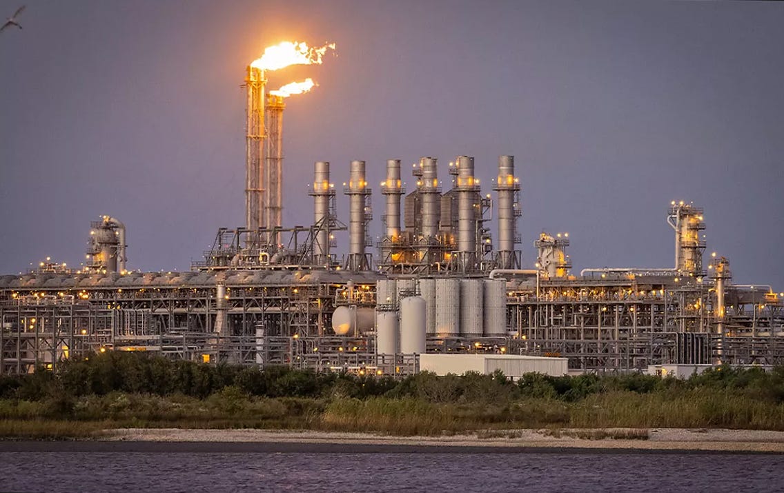 Massive LNG plant flaring off methane.