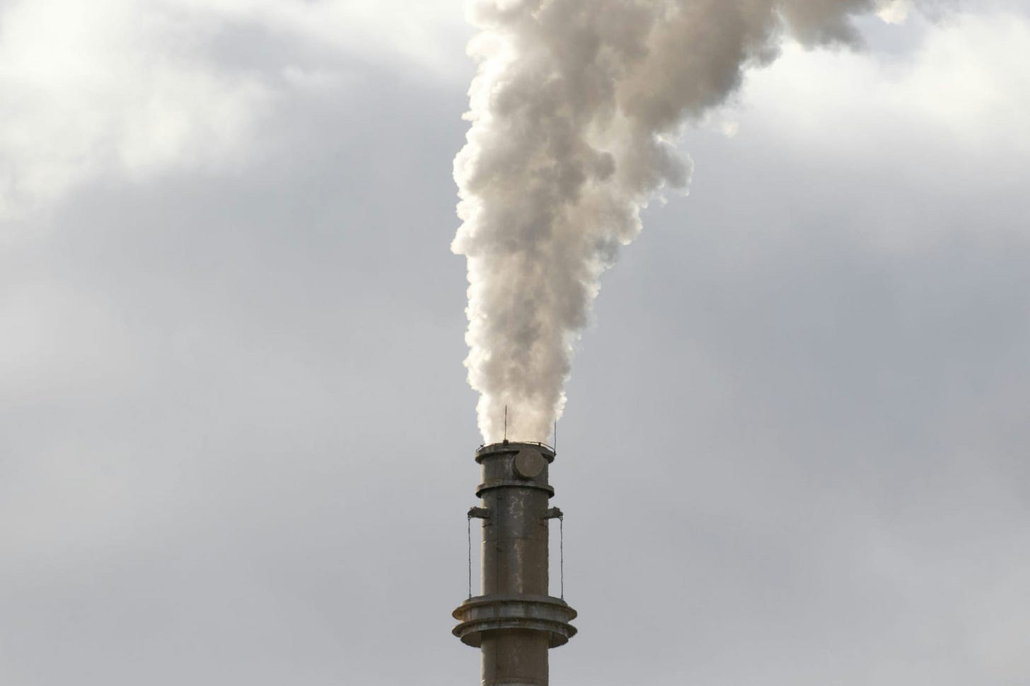 Smoke belching from a smoke stack