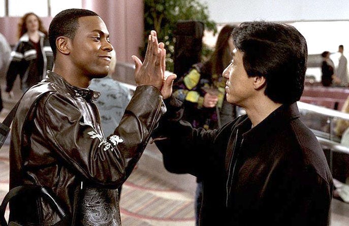 Chris Tucker Jackie Chan high five allthefanfare.com
