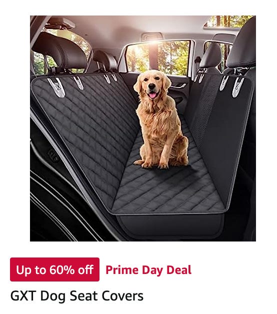 A dog seat cover ad; the seat cover is stretched from the headrests of the back seat to the headrests of the front seat and covers the back seat entirely. There is a photoshopped Golden Retriever sitting in the middle of it.