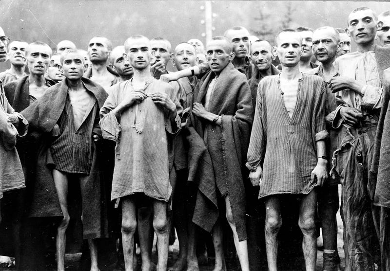 Prisoners pose in liberated Nazi concentration camp | Harry S. Truman