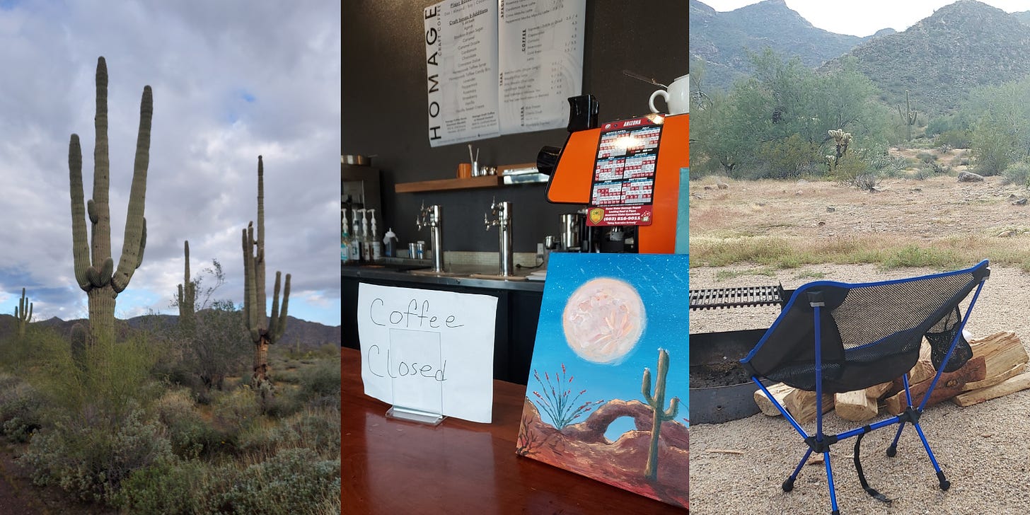 Iconic saguaro cacti stand tall in front of a far off mountain range under a cloudy sky. Center: A handwritten coffee closed sign sits on a counter next to a painting of a cactus. Right a camp chair faces out toward the desert and mountains.