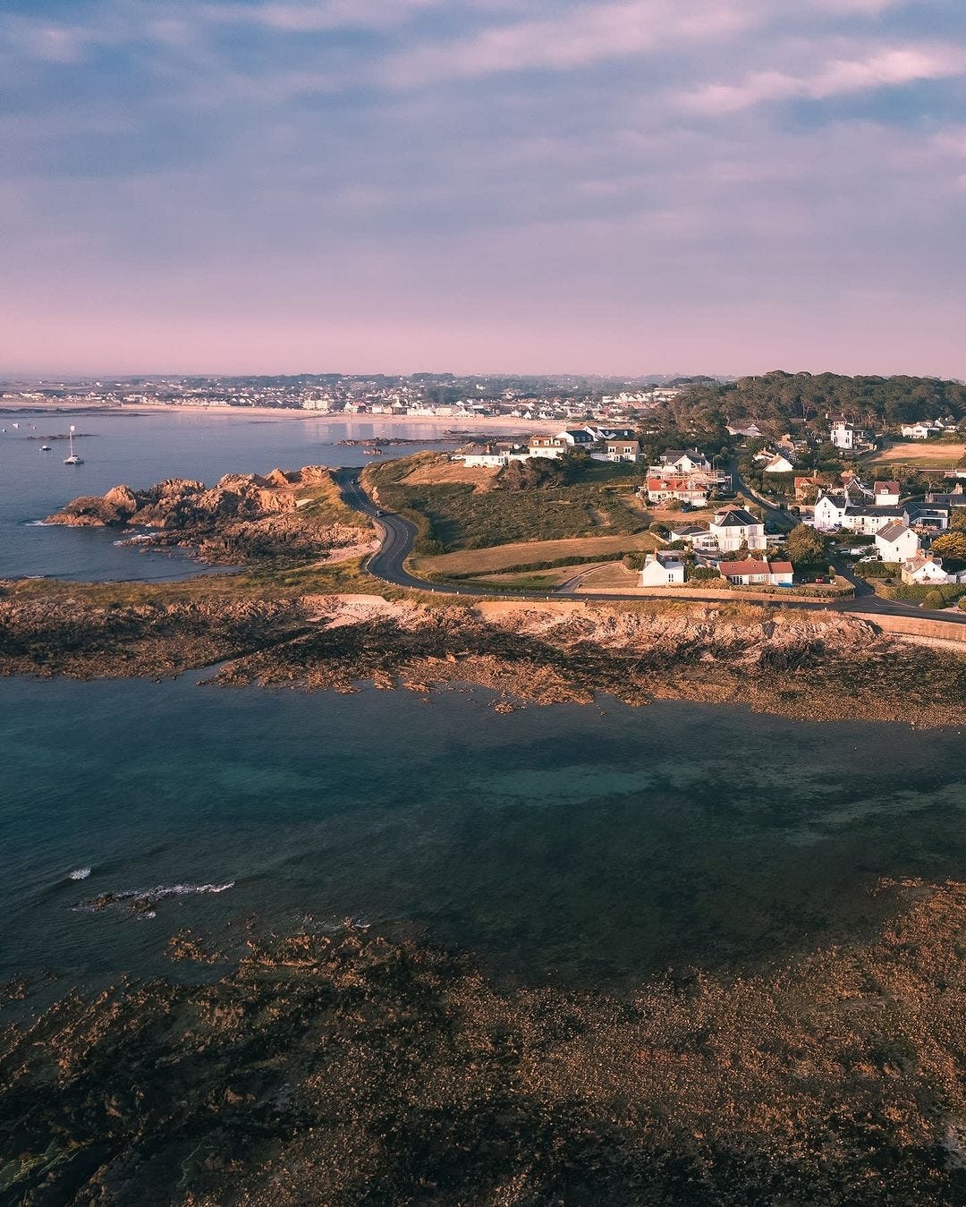 “With beaches, restaurants, kiosks, nature reserves and fortifications, there’s nowhere quite like the Guernsey West Coast.” Caption and photo by Visit Guernsey. 