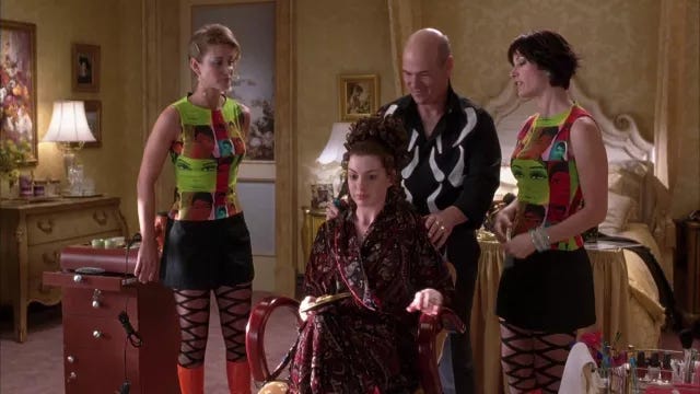Custo Barcelona Sleeveless Mod Girl Mini Dress worn by Paolo's Assistant #1 (Sparrow Heatley) in The Princess Diaries 2: Royal Engagement
