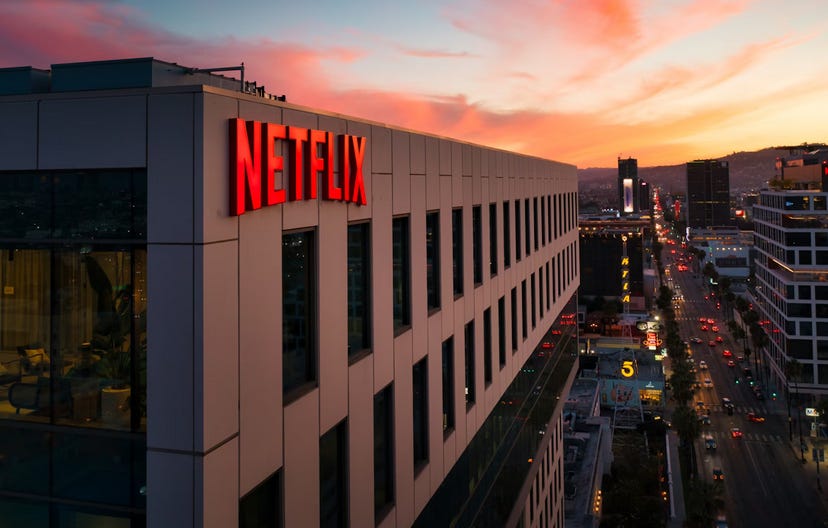 An image of the Netflix offices with the logo on the side of the building, against the LA city backdrop