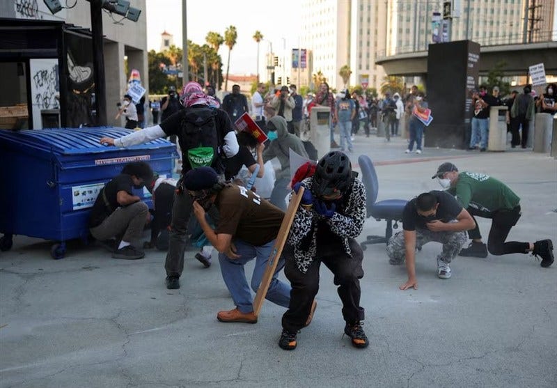 Riot Police Clash with Anti-ICE Protesters in LA after Immigration ...