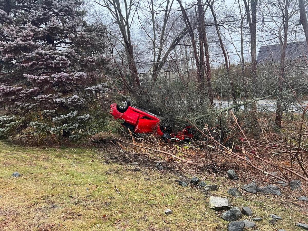Vehicle rolls over on Route 138