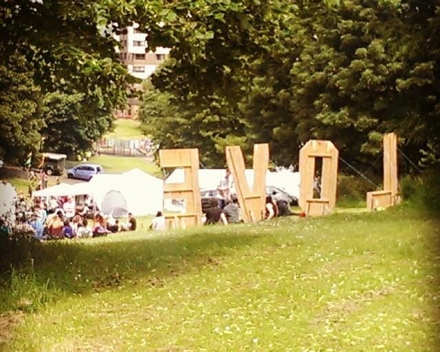 Tall wooden letters spell out LOVE at Peace in the Park in the Ponderosa, Sheffield