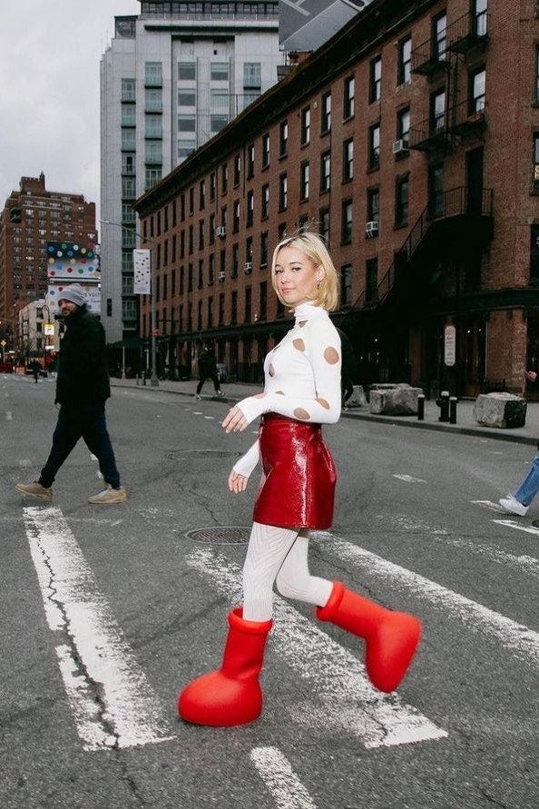These funny MSCHF red boots are having a viral moment | Vogue India