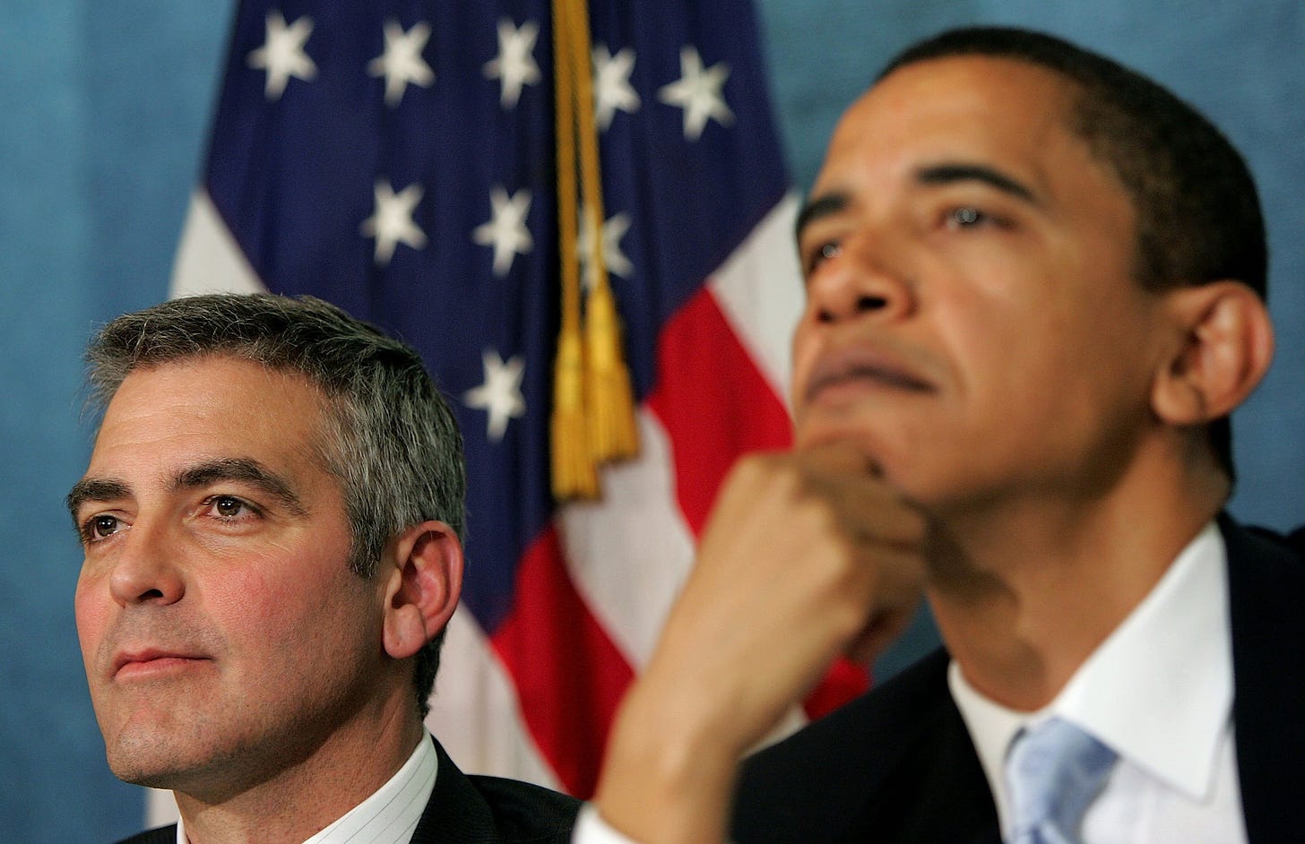 Image may contain Barack Obama George Clooney Accessories Formal Wear Tie Adult Person American Flag and Flag