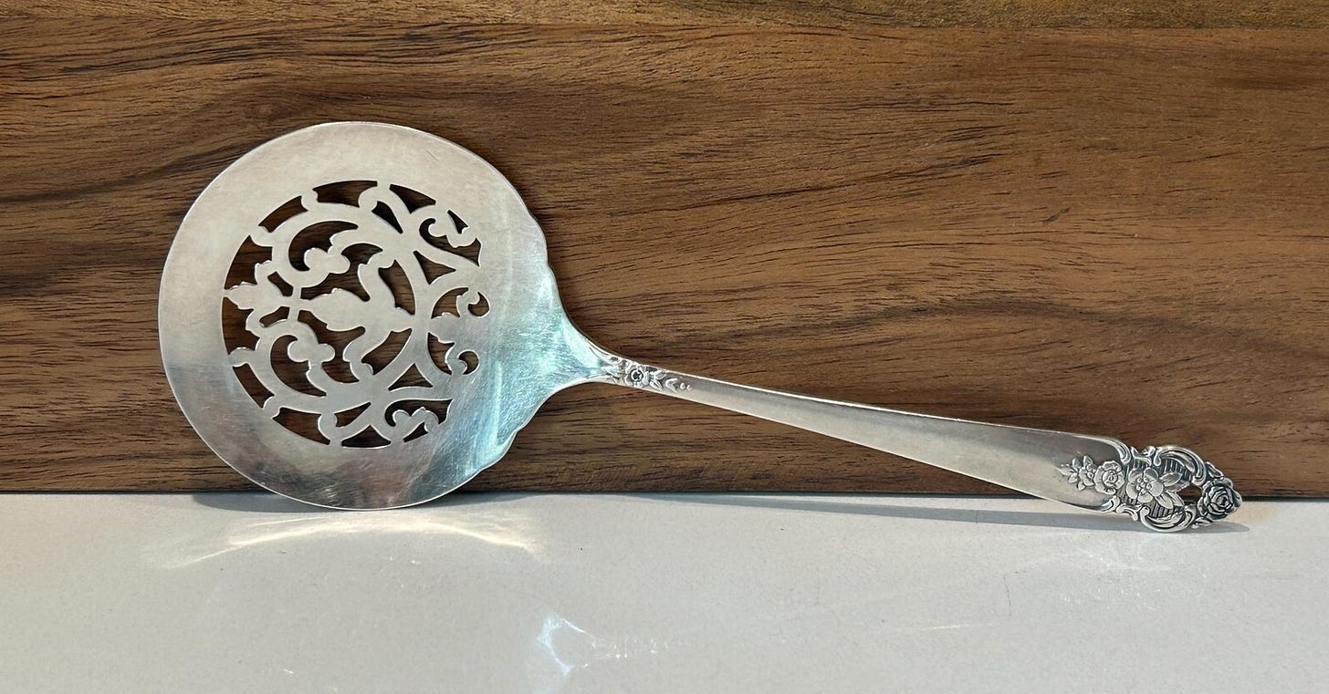 decorative silverplate tomato server.