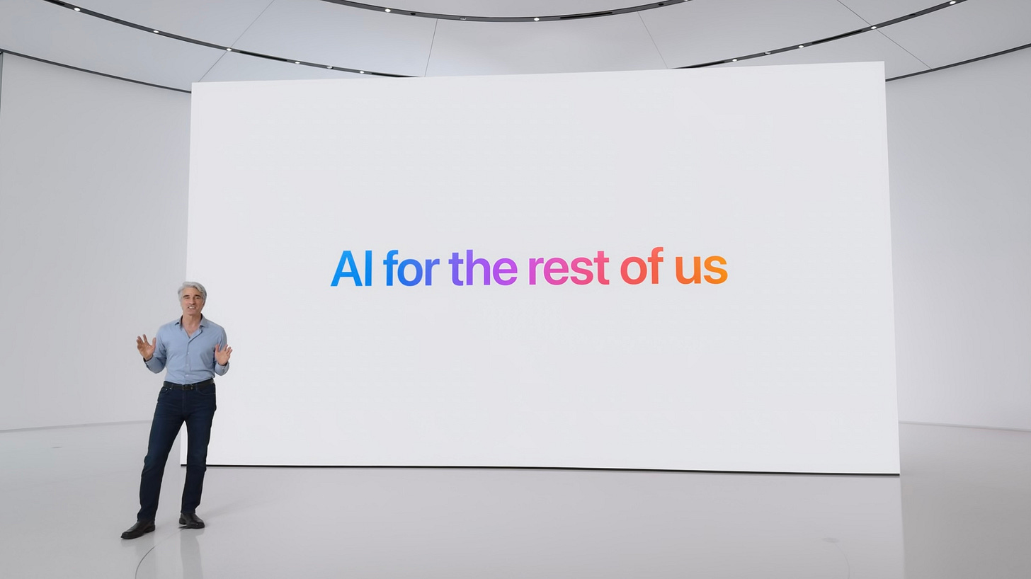 A still from Apple’s keynote showing Craig Federighi, Apple’s Senior Vice President of Software Engineering in front of a screen with the words ‘AI for the rest of us’