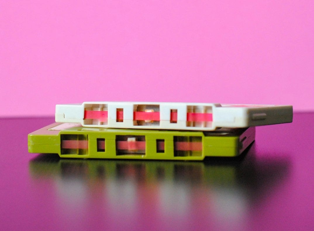 white and green cassette tapes