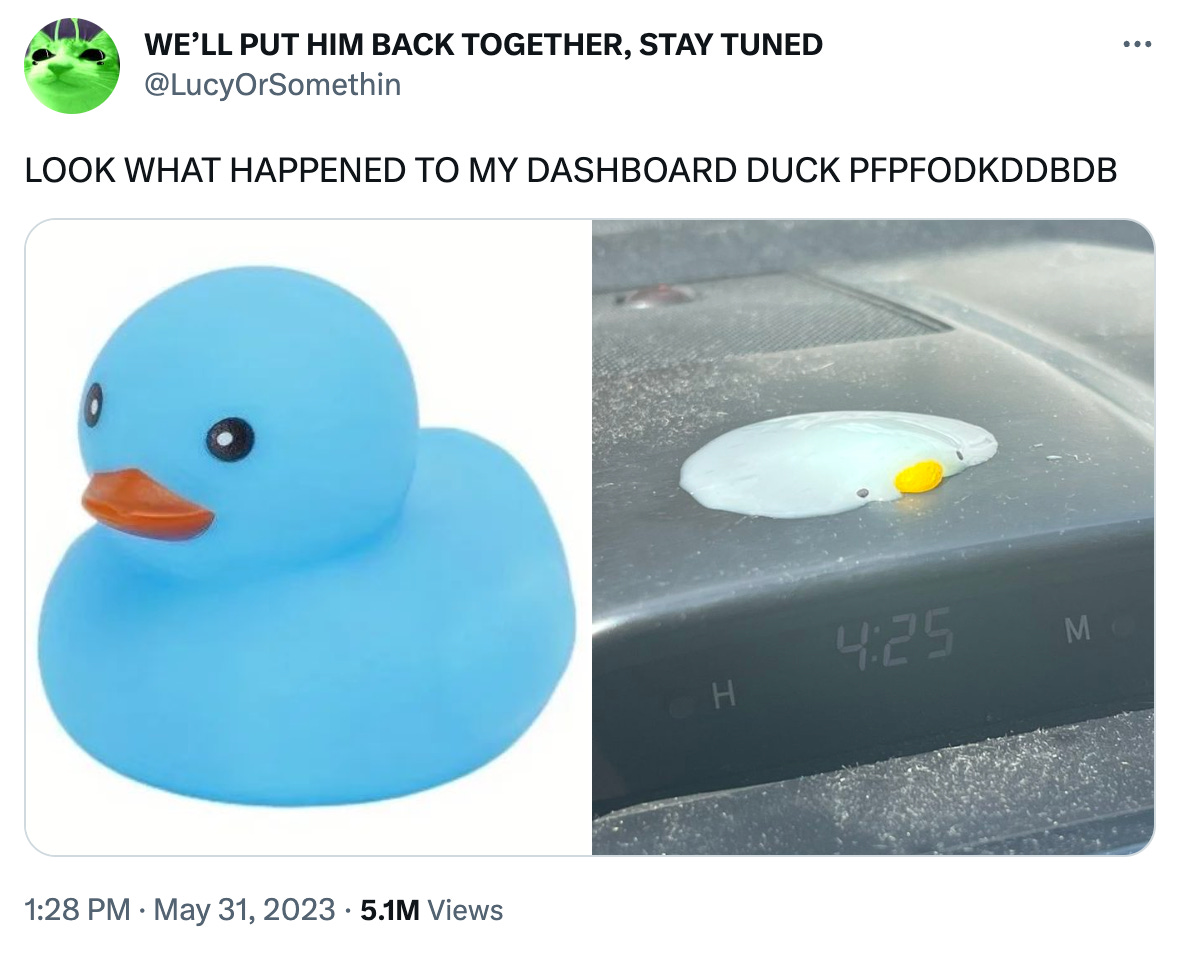 A tweet from @LucyOrSomethin that reads, "LOOK WHAT HAPPENED TO MY DASHBOARD DUCK PFPFODKDDBDB" and features two images - on the left is a blue rubber duck, and on the right is that same rubber duck melted into a pile of goo on their dashboard. But it also kind of looks like someone just flattened it; the beak and eyes are still on the front -- they're just flat.