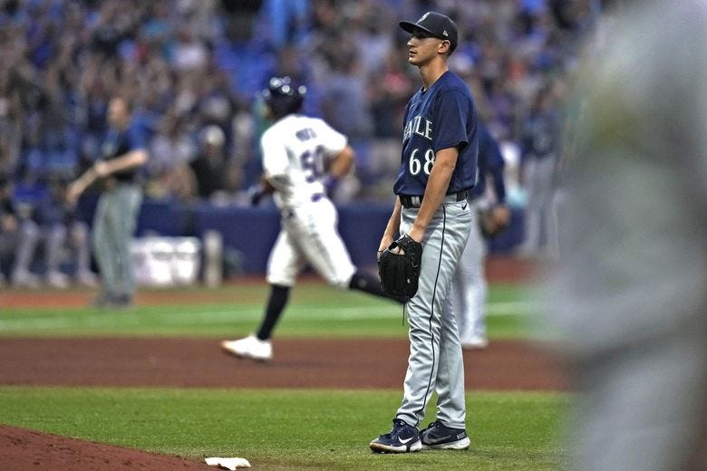Seattle Mariners starting pitcher George Kirby (68) reacts as Tampa Bay Rays&#8217; Rene Pinto (50) runs around the bases after his two-run home run during the seventh inning of a baseball game Friday, Sept. 8, 2023, in St. Petersburg, Fla. (Chris O&#8217;Meara / AP)