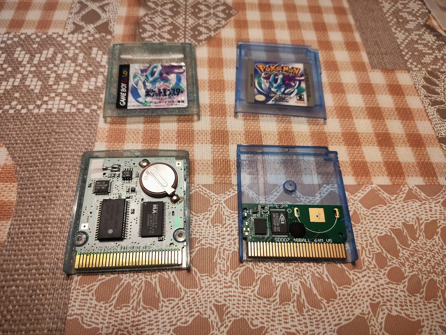 Copies of Pokémon Crystal. Left side is a genuine Japanese cartridge, right side is a reproduction (Photo credit: Lucent)