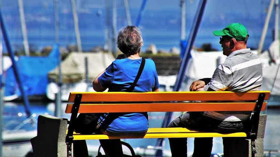Older couple on a first date by the sea