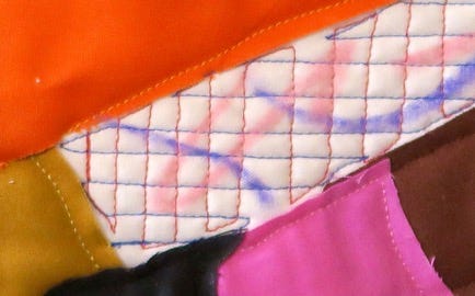 A close-up of a quilt

Description automatically generated