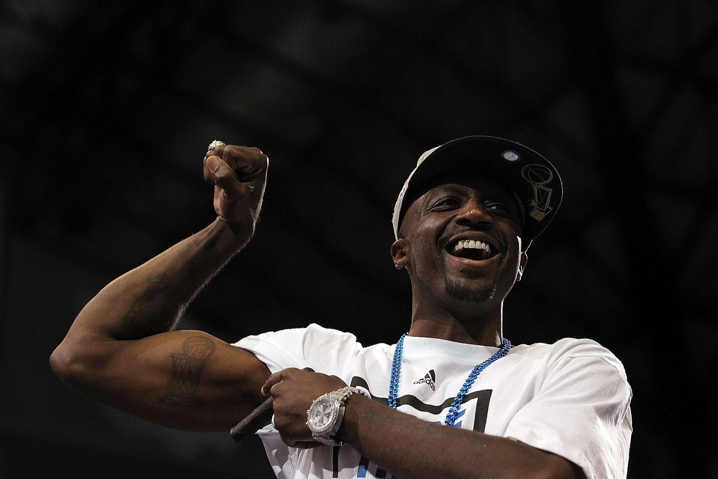 DALLAS, TX - JUNE 16:  Jason Terry of the Dallas Mavericks shows off his NBA trophy tattoo after the Dallas Mavericks Victory Parade on June 16, 2011 in Dallas, Texas.  (Photo by Ronald Martinez/Getty Images)