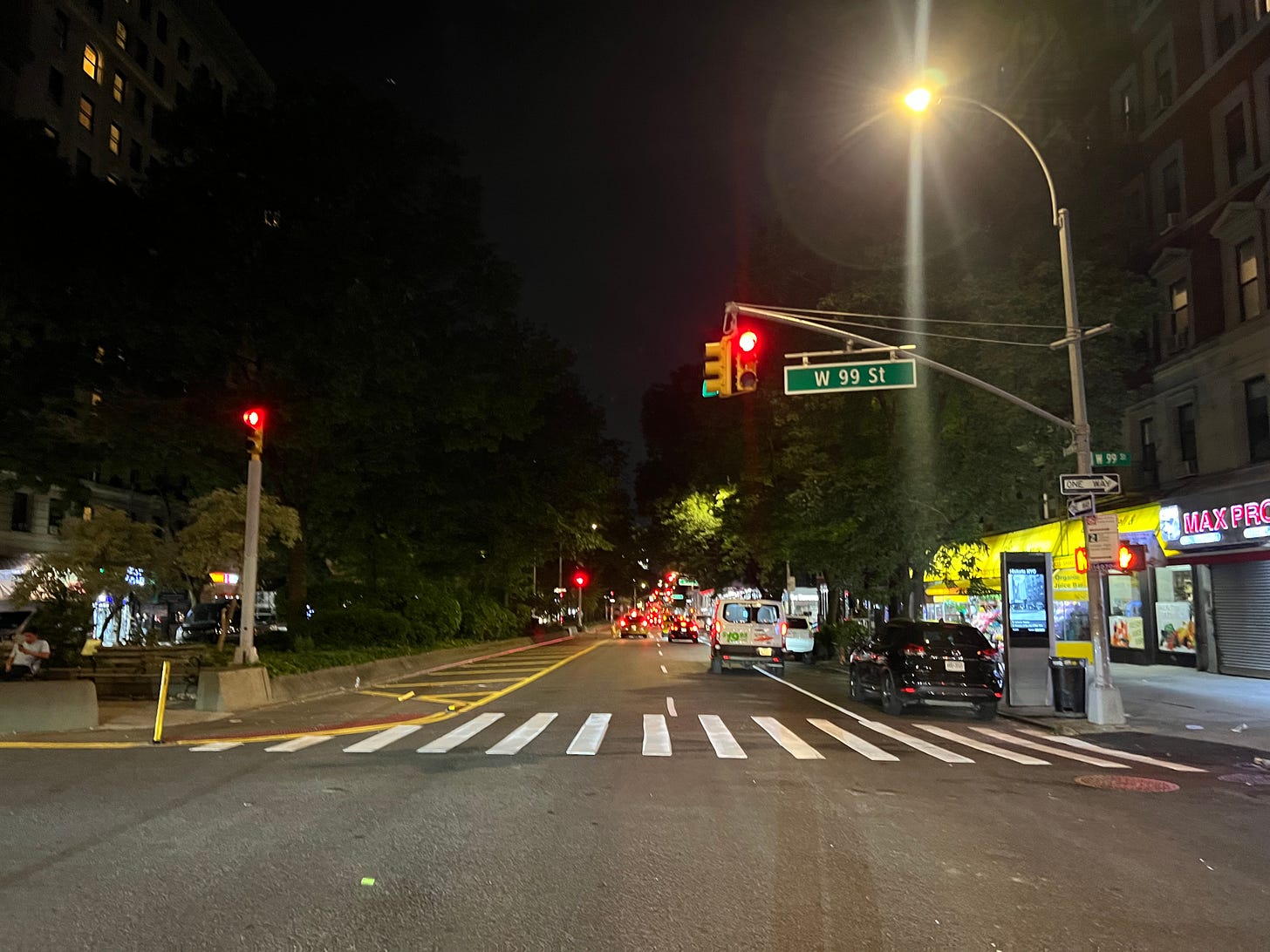 A photo of red stoplights as far as the eye can see.