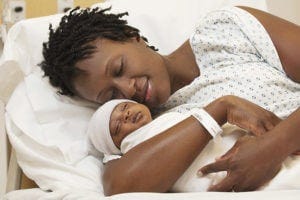 Premature baby with mother in hospital