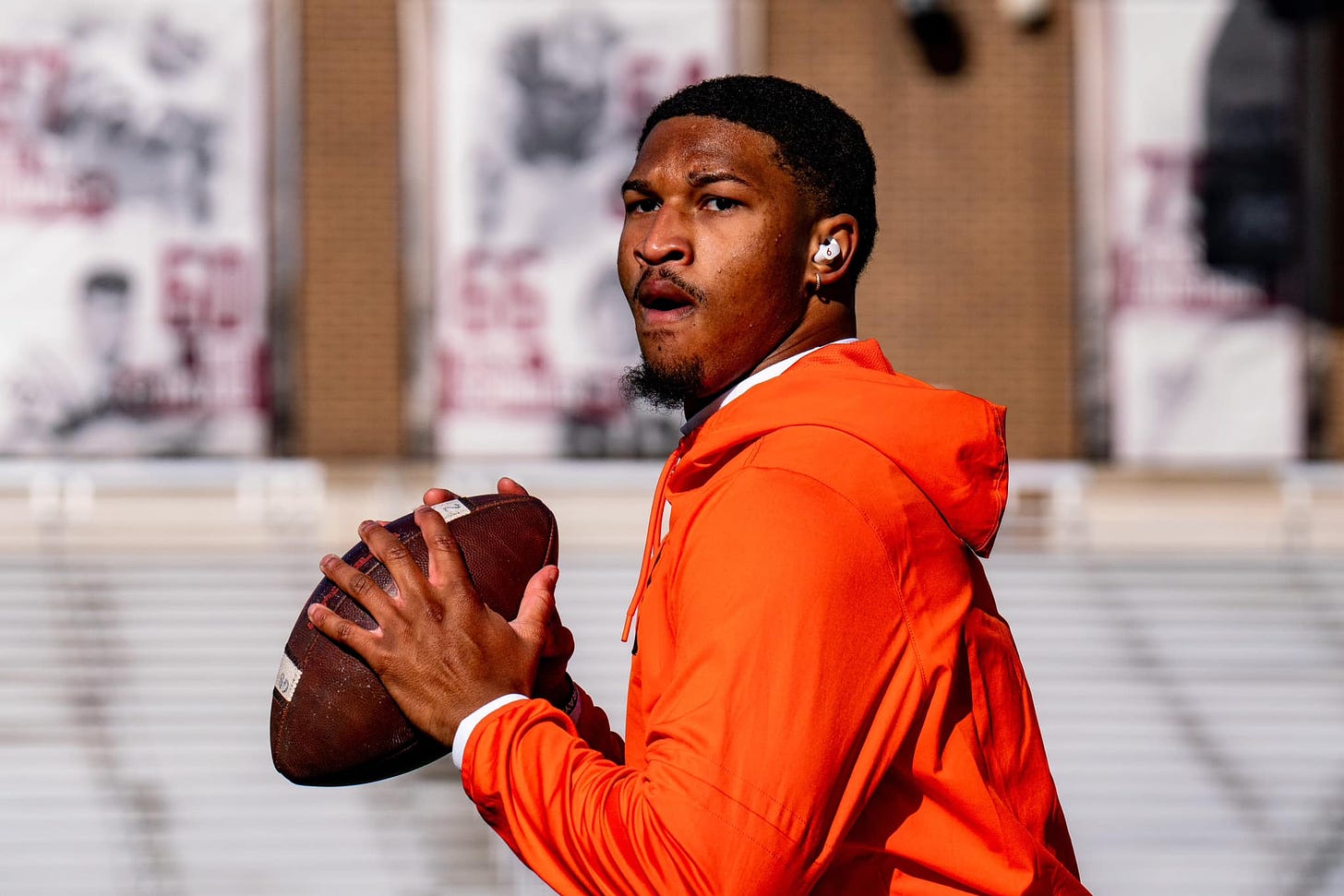 Virginia Tech quarterback Kyron Drones warms up before playing Boston College.