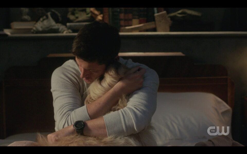 SPN Dean Winchester hugging Miracle dog tight