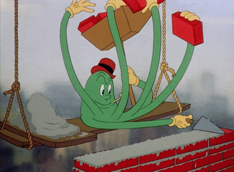 An animated octopus lays bricks