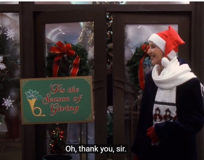 Screenshot from the TV show Friends episode when Phoebe volunteers for a holiday bell-ringing campaign