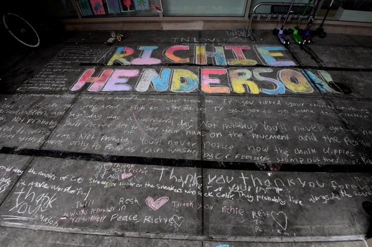 One of two memorials outside the Avenues: The World School made for crossing guard Richard Henderson, who worked at the school, but was recently killed during an attack while riding the NYC subway.
