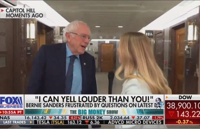 Bernie Sanders answers a question from a Fox Business reporter in a Senate hallway. Chyron reads 'I CAN YELL LOUDER THAN YOU!' with subheading 'BERNIE SANDERS FRUSTRATED BY QUESTIONS ON LATEST BILL.'