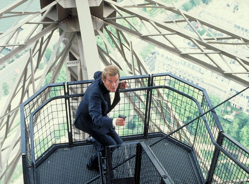 Iconic Bond moment as Moore in a dinner suit races around the Eiffel Tower in pursuit.