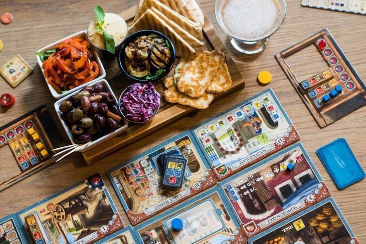 Where To Play Board Games In London: a mezze platter and board games at draughts