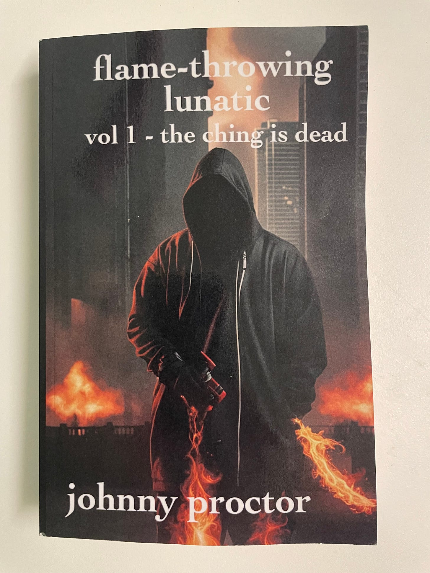 flamethrowing lunatic volume 1 the ching is dead by Johnny Proctor