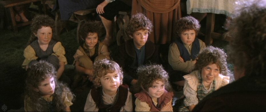 Bilbo telling hobbit children about his adventures