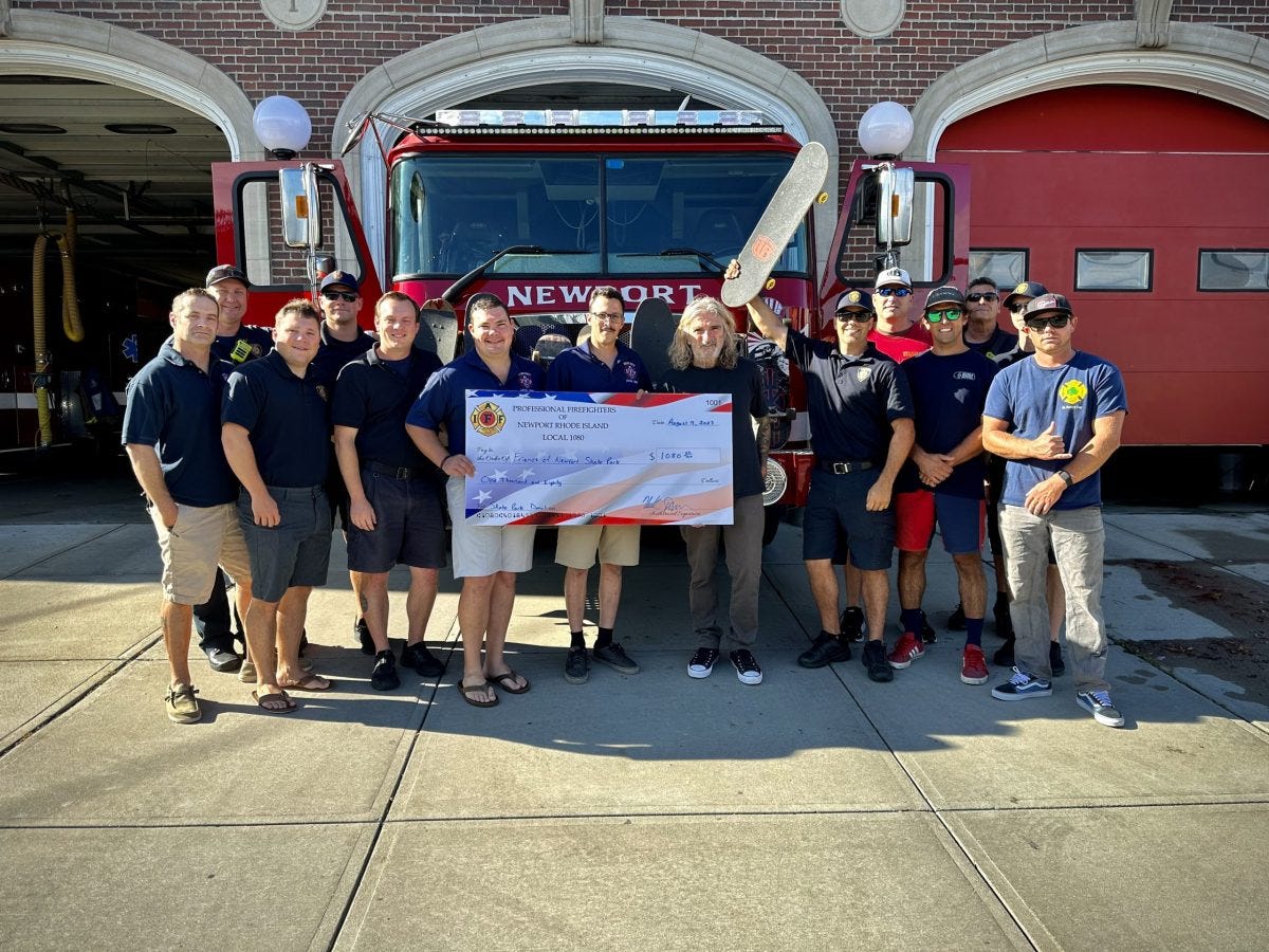 Newport Firefighters donate to Friends of Newport Skatepark