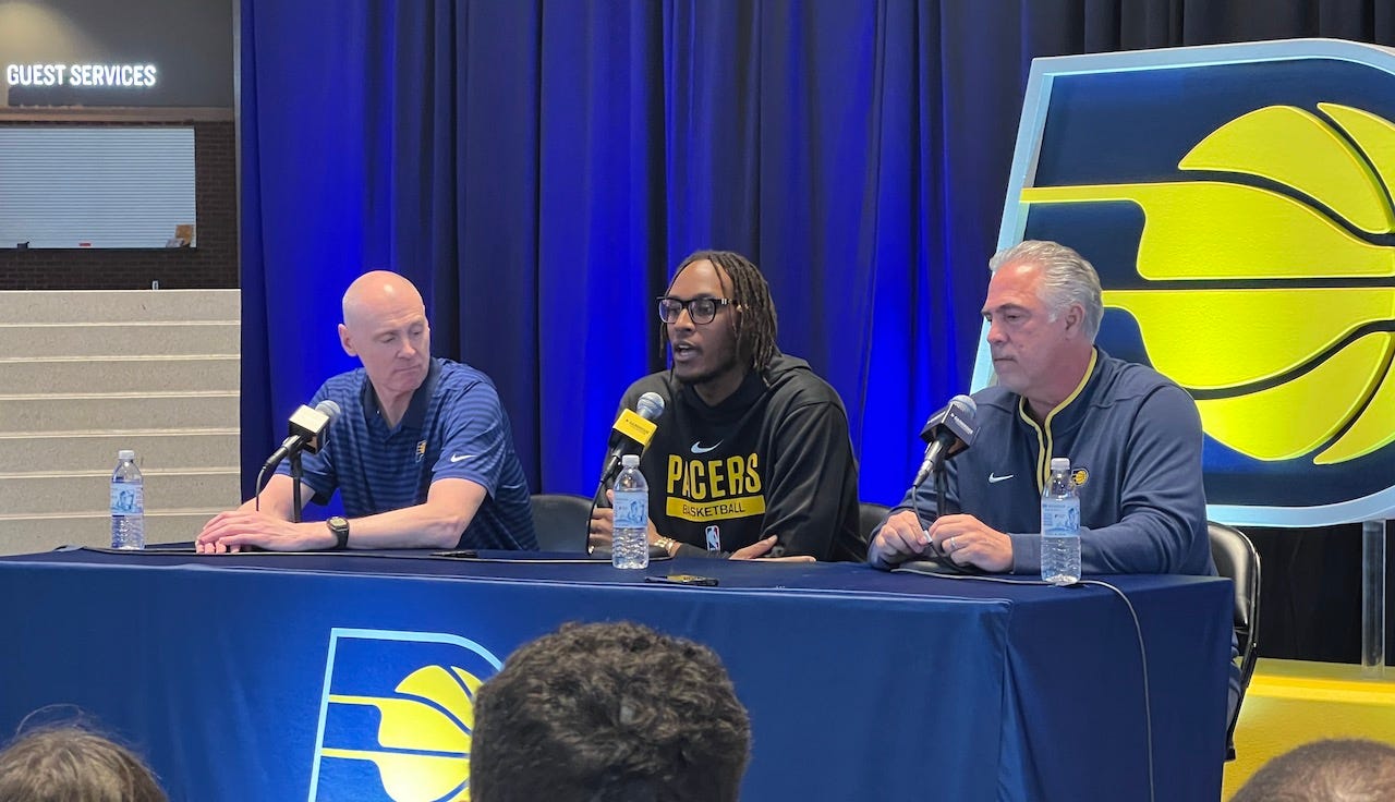 Myles Turner joined on stage with coach Rick Carlisle and team president Kevin Pritchard after signing a two-year contract extension on Jan. 30.