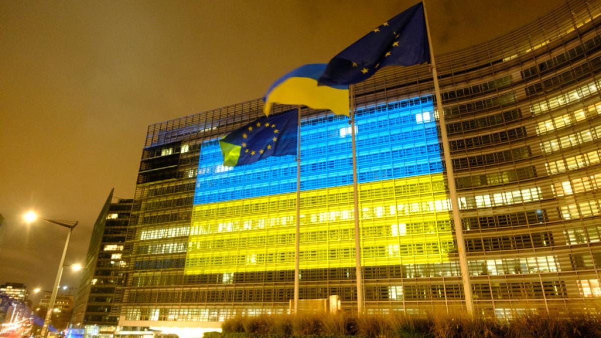 European Commission project an Ukrainian flag on the front of the Berlaymont, the EU Commission headquarter for the 1000 days of the large scale invasion of Ukraine by Russia on November 18, 2024 in Brussels, Belgium. (Photo by Thierry Monasse/Getty Images)