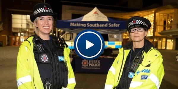 Two female officers at the Southend Safe Space outside at night